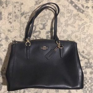 Black leather Coach purse with gold detailing